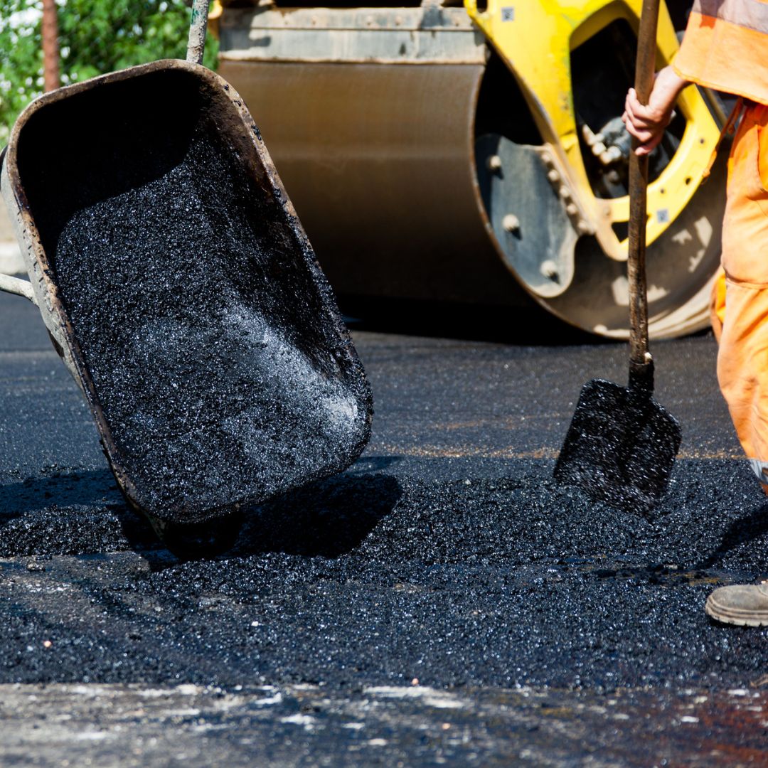 Asphalt being poured.