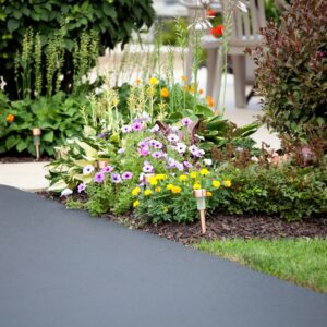 Newly paved asphalt driveway.