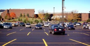 Freshly paved parking lot in the fall showing foliage colors