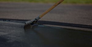 Applying a sealcoat to asphalt