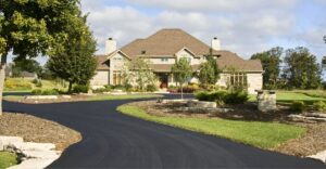 home with a paved driveway